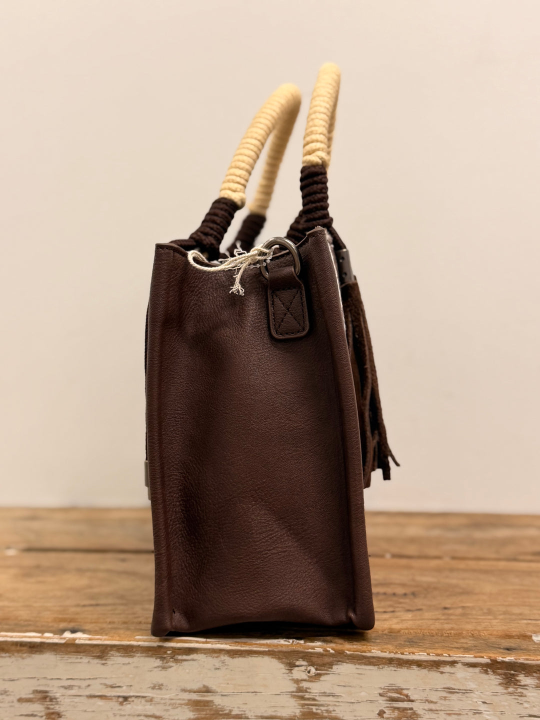 WRANGLER COW PRINT TASSEL CROSSBODY BAG